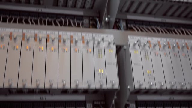 Flashing LEDs of Internet, ethernet equipment indicate huge data traffic. Shot in motion