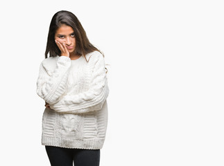 Young beautiful arab woman wearing winter sweater over isolated background thinking looking tired and bored with depression problems with crossed arms.