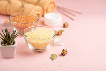 Beautiful spa composition on a pink background. Spa, relaxation, skin care and beauty