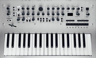 metallic analog synthesizer, close-up view