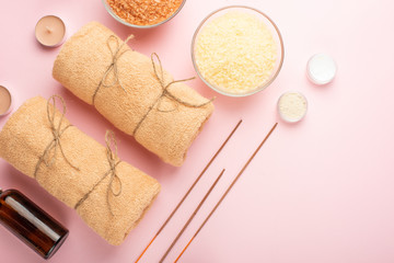 Beautiful spa composition on a pink background. Spa, relaxation, skin care and beauty
