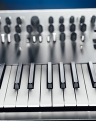 metallic analog synthesizer, close-up view