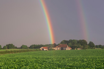 double rainbow over lincolnshire farmland