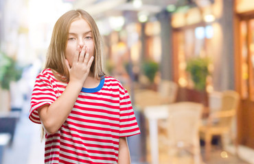 Fototapeta premium Young beautiful girl over isolated background bored yawning tired covering mouth with hand. Restless and sleepiness.