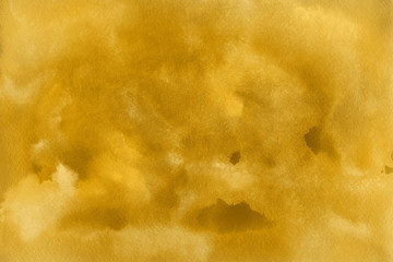 Gold luxury ink and watercolor textures on white paper background. Paint leaks and ombre effects. Hand painted abstract image.