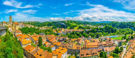 Cityscape of Fribourg dominated by tower of the cathedral of Saint Nicholas, Switzerland