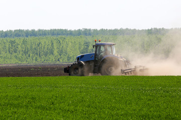 Heavy machine tractor plow work field
