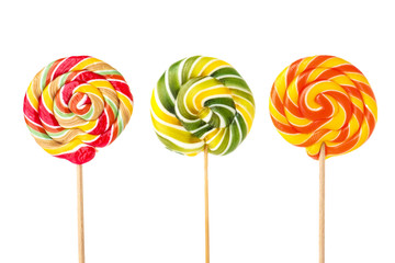 Different tasty colorful candies on white background