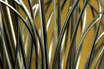 Macros of Chef's collection of steel kitchen wire whisks