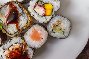 Uramaki and Hot Roll on a plate