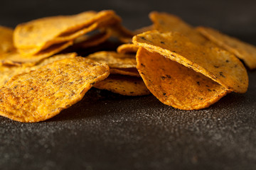 crispy corn chips. potato chips, nachos
snack.