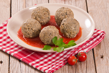 Meatballs with tomato sauce.