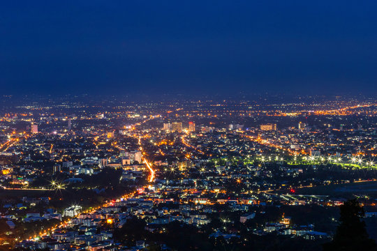 View cityscape over the city center of Chiang mai,Thailand at twilight night. © Thinapob