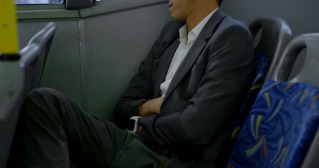 Business commuter sleeping while travelling in bus 4k - Powered by Adobe
