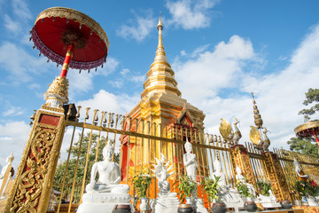 The golden pagoda of Wat Phra That Doi Wao located on the mountains peak in Mae Sai district nearly the border between Thailand and Myanmar. The temple is the perfect spot for border view.
