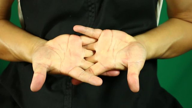 Man  stretching arms , close up