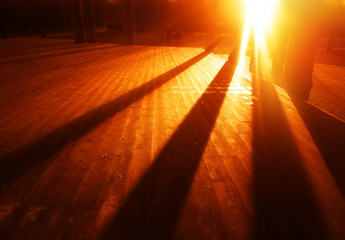 Diagonal dramatic shadows from park columns object background