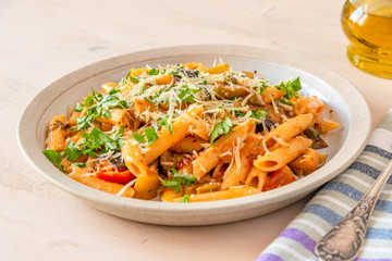 Pasta caponata on a plate close up