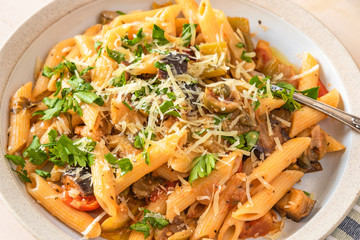 Pasta caponata on a plate close up