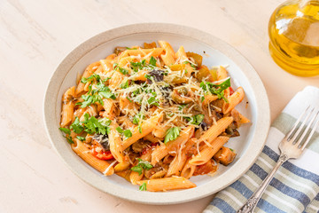 Pasta caponata on a plate close up