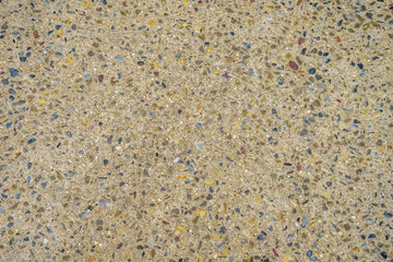 Cement pavement with interspersed small stones
