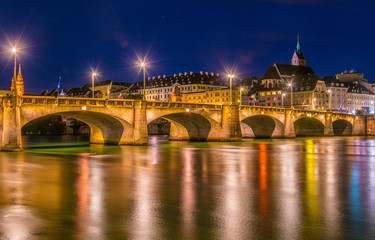 Sunset view of riverside of Rhine in Basel with Saint Martin church, Switzerland
