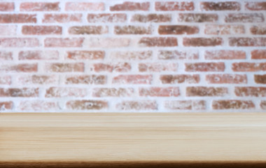 Selected focus empty wooden table and wall texture or old brick wall blur background image. for your photomontage or product display