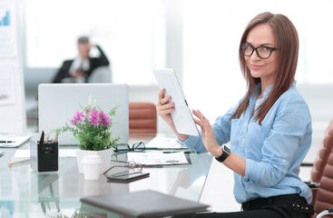 successful business woman on work place in office