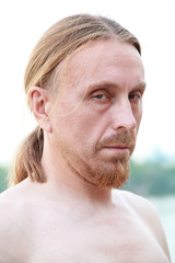 Obraz premium Russian man with red beard, cunning, close-up portrait