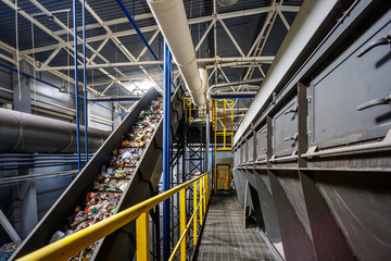 moving conveyor transporter on Modern waste recycling processing plant. Separate and sorting...