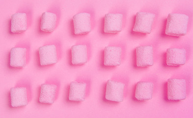 Marshmallows on pink background