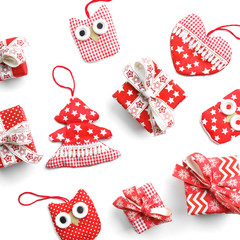 Fototapeta premium Flat lay. Christmas, gifts, Christmas boxes and Christmas toys on a white table