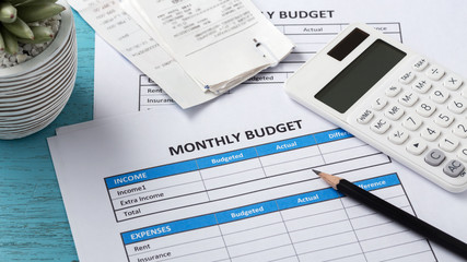 Fototapeta na wymiar Monthly budget planning with calculator