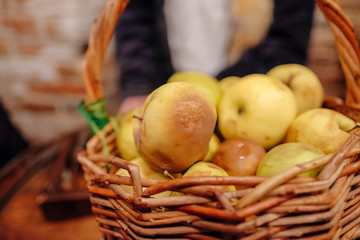 Apples in a basket on the table