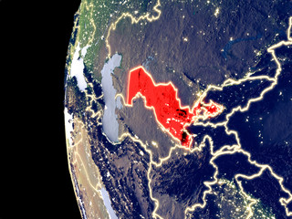 Night view of Uzbekistan from space with visible city lights. Very detailed plastic planet surface.