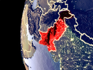 Night view of Pakistan from space with visible city lights. Very detailed plastic planet surface.