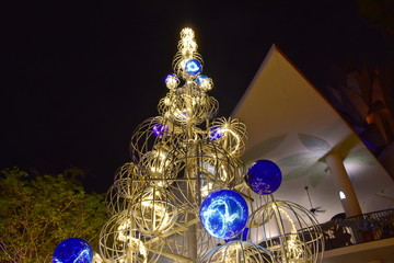 Orlando, Florida.  November 18, 2018 Top view of Christmas tree and triangular building at night