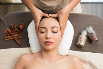 Ayurvedic Head Massage Therapy on facial forehead