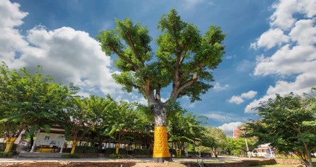 Big tree decorated with angels in Southeast Asian religious ceremony.