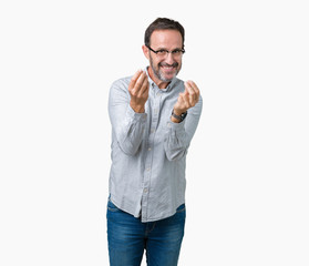 Handsome middle age elegant senior man wearing glasses over isolated background Doing money gesture with hand, asking for salary payment, millionaire business