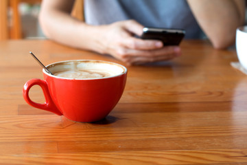 Woman enjoying warming drink, Late coffee in a cup