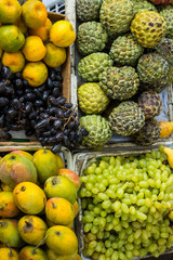Indian street market: colorful fruits and vegetables; roads of Mumbai