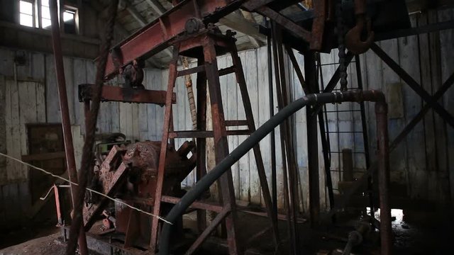 Old pumping station.The pump that rocked the salt solution from a depth of 60 meters. Old salt plant in Drohobych Ukraine.