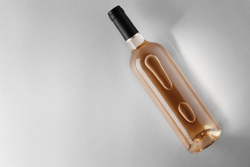 Bottle of wine on grey background