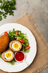 Meatballs with minced meat stuffed with boiled egg.