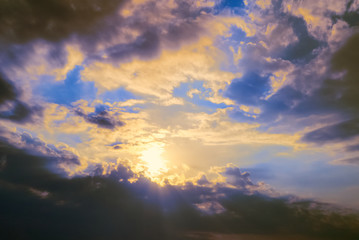dramatic sky in the clouds. the real rays of the sun make their way. concept inspiration.