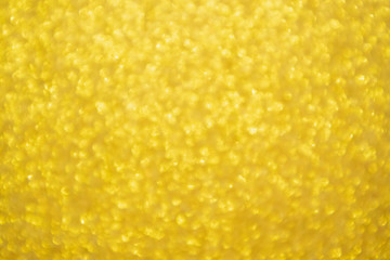 Abstract Gold glitter festive Christmas texture background blur with bokeh light