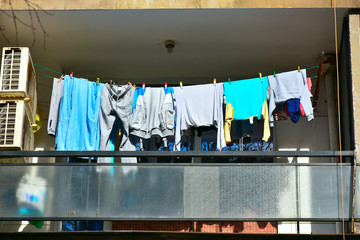 clothes hanging on the balcony,