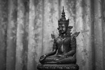 Fototapeta premium The old Buddha Statue in Black and white Tone 