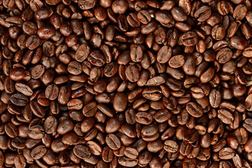 Roasted brown coffee beans pattern, background, top view